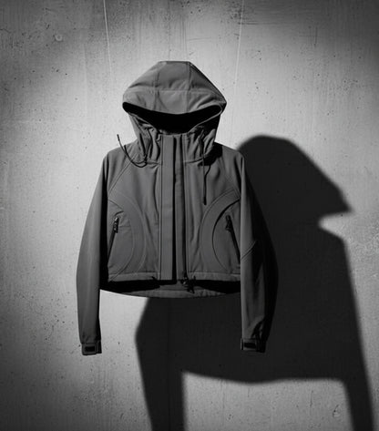 Gray hooded jacket on a textured gray background